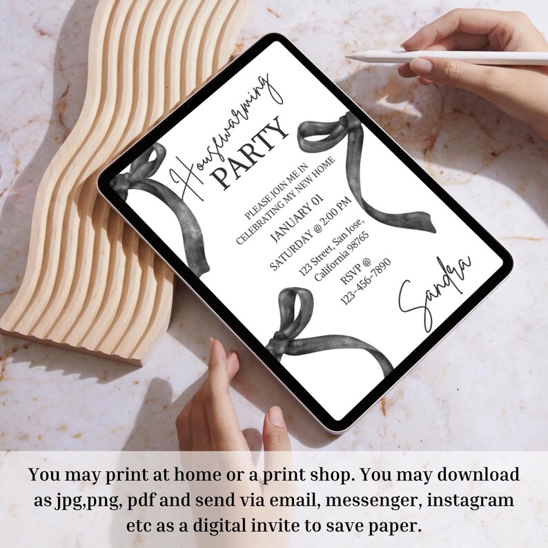 May include: A black and white digital invitation with a housewarming party theme. The invitation features a handwritten title, "Housewarming Party", and a decorative ribbon design. The text includes the date, time, and location of the party, as well as the host's name, "Sandra".