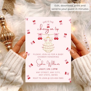 May include: A baby shower invitation card with a light pink background featuring red cherry illustrations, pink bows, and a central graphic of a ruffled baby romper. The text reads: She is the cherry on top, Please join us for a baby shower honoring Sophia Williams, July 25, 2pm, Any Street, Any City, Any State, 98765, RSVP to Joan at 123-456-7890.
