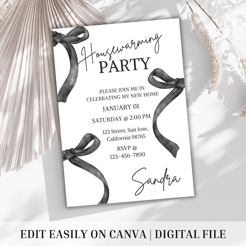 May include: A black and white housewarming party invitation with a handwritten font. The invitation features black watercolor ribbons with bows and the text "Housewarming Party". The invitation includes the date, time, address, and RSVP information. The name "Sandra" is handwritten at the bottom of the invitation.