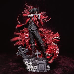 May include: A red and black detailed figurine of a vampire character with a cape and a sword. The character is standing on a base with a skull and crossbones design.