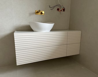 Bathroom cabinet with grooved front