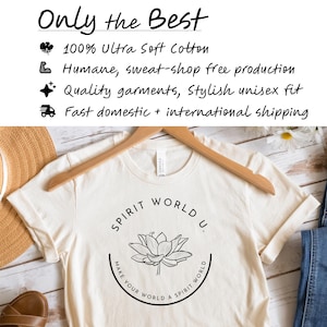 May include: A white t-shirt with a black graphic design featuring a lotus flower and the text "SPIRIT WORLD U. MAKE YOUR WORLD A SPIRIT WORLD".
