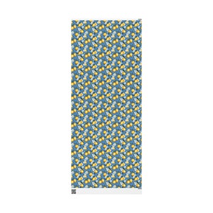 May include: A seamless pattern featuring yellow lemons and white flowers on a blue background.