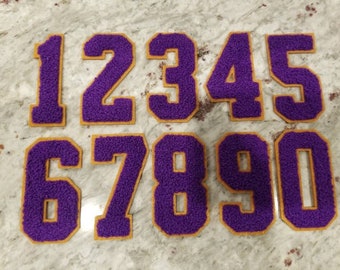 Purple chenille 2.75" with old gold trim numbers; adhesive backing; Cheer; Sports; Fraternity; Sorority; Jackets; Sweaters