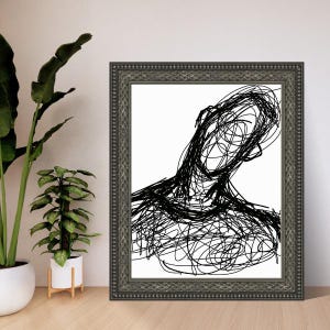 May include: A framed abstract art print featuring a black line drawing on a white background. The artwork depicts a human form created with continuous, scribbled lines. The frame is a dark gray color.