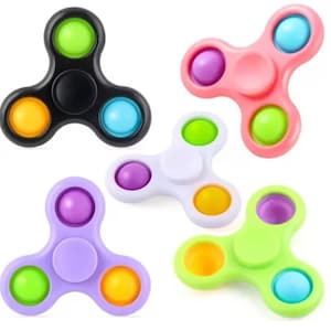 May include: Five fidget spinners in different colours: black, pink, white, purple and green. Each spinner has three arms with a round, colourful button on each arm.