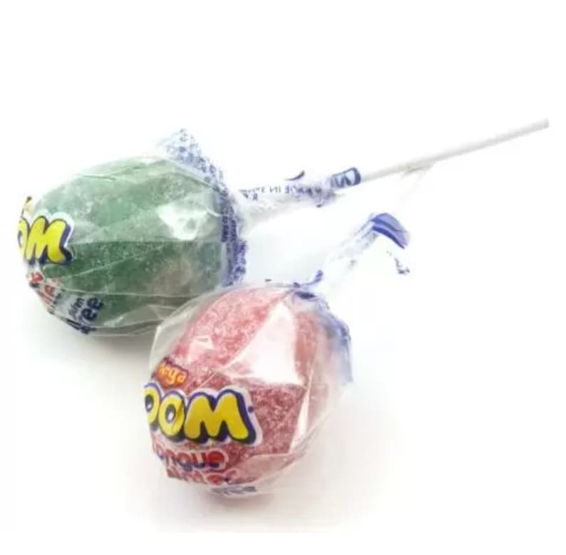 May include: Two individually wrapped lollipops, one green and one red, with the word "WOO!" printed on the wrappers. The lollipops are on white sticks.