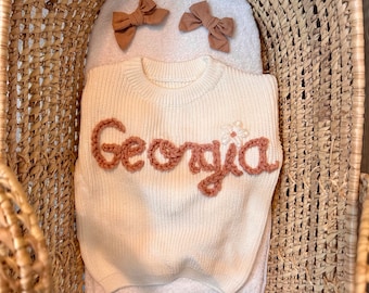 Embroidered baby sweaters