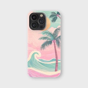 May include: A phone case featuring a watercolor illustration of a beach scene. The design includes a pink and blue sky, a turquoise wave, a sandy shore, and palm trees. The case has a pastel color palette.
