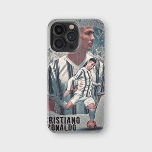 May include: A phone case featuring a collage of Cristiano Ronaldo in a soccer uniform. The design includes a portrait and action shot of the soccer player, with the name "Cristiano Ronaldo" printed at the bottom. The case has a gray border.