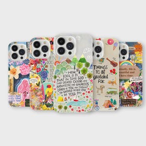 May include: A selection of phone cases with vibrant designs. The cases display diverse illustrations, such as flowers, a parrot, mountains, a boat, and text that reads "How cool is it..." and "Things to be grateful for:"
