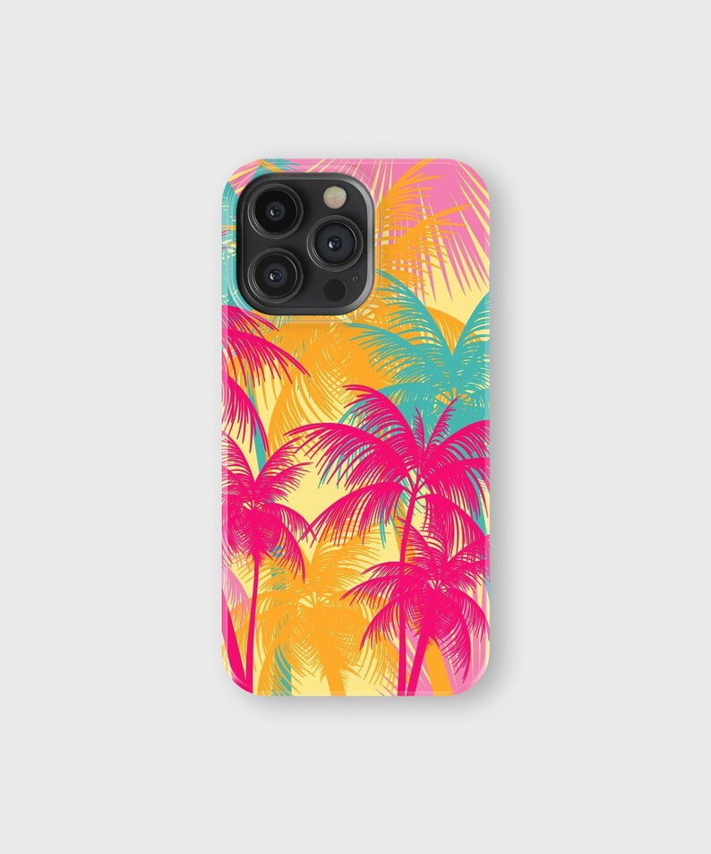 May include: A phone case featuring a vibrant tropical palm tree design. The case showcases a repeating pattern of pink, orange, and teal palm trees against a yellow background. The case has a glossy finish and a camera cutout.