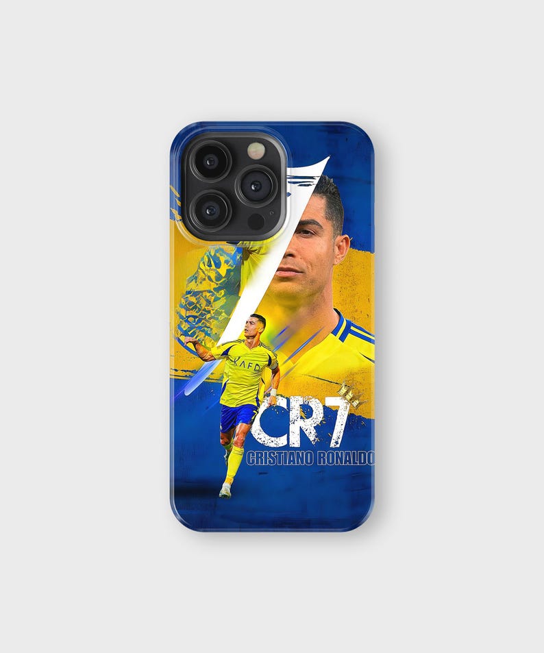 May include: A blue phone case featuring a portrait of Cristiano Ronaldo with a yellow and blue background. The case has the text "CR7" and "Cristiano Ronaldo" in white.