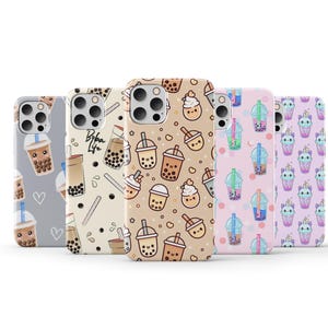 May include: Five different phone cases with a boba tea theme. The cases are all white with different designs featuring boba tea cups, straws, and the text "Boba Life".