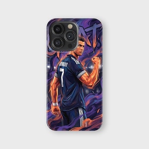 May include: A phone case featuring a stylized illustration of a soccer player in a dark blue jersey with the number 7 and the name "RONALDO". The background has purple and orange smoke-like effects.