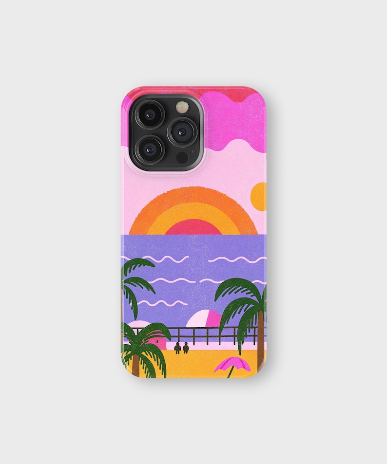 May include: A phone case featuring a colorful beach scene. The design includes a sunset with a rainbow, palm trees, and a pier. The case has a pink border and a glossy finish, offering protection and style.