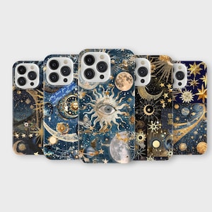 May include: A collection of celestial-themed phone cases. Each case features a unique design with moons, stars, and suns in shades of blue, gold, and white. The cases are arranged in a row, showcasing the variety of cosmic patterns.