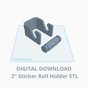 May include: A 3D printed design for a 2-inch sticker roll holder. The design includes a base and a roller. The base is a grey, rectangular shape with two cutouts for the roller. The roller is a grey cylinder with a small hole in the centre. The design is shown on a grid background.