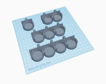 May include: Three rows of gray plastic storage containers with three compartments in each row. The containers are designed to hold small items, such as paint pots or other craft supplies.