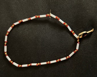 red & white mix seed bead basic bracelet with red wine charm