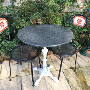 Round Marble Table and Two Bistro Chairs