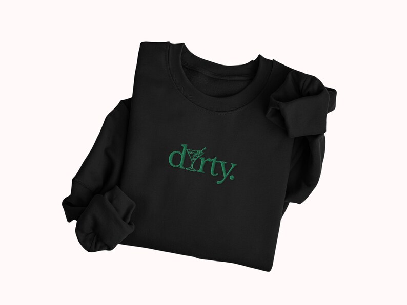 May include: Black sweatshirt with a green embroidered design that says "dirty" with a martini glass graphic.