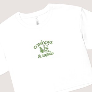 a white t - shirt with the words cowboys and tequila on it