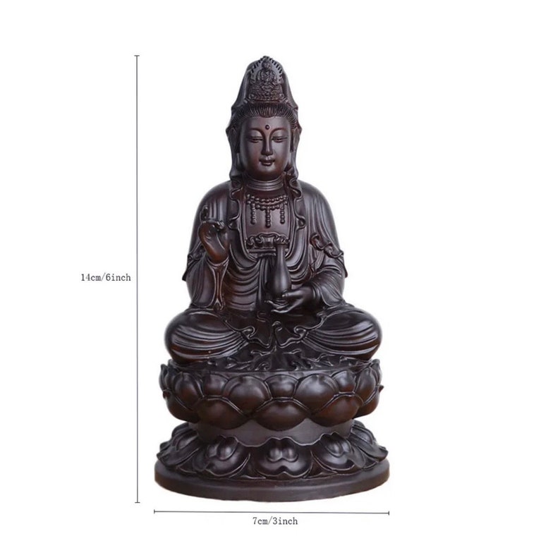 May include: A dark brown seated Buddha statue, 6 inches tall and 3 inches wide, atop a lotus flower base. The statue features detailed carvings of robes, jewelry, and a serene facial expression. The figure holds a small vase.