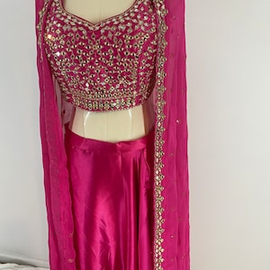 Cowl dress with shrug and crop top. Beautiful mirror detailing. Perfect for weddings. Rani pink color.