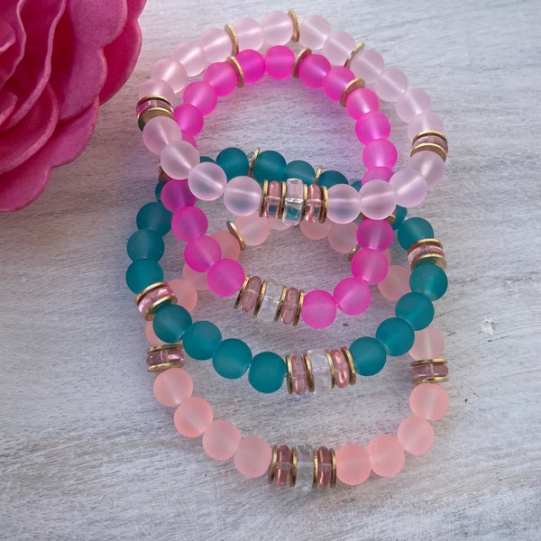 Polished sea glass bracelets. Pick out of 4 colors. Light pink, light coral, hot pink, or teal