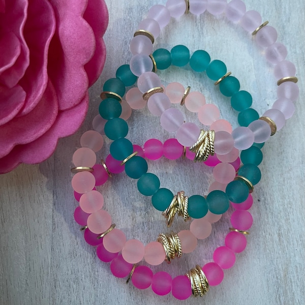 Polished sea glass bracelets. Pick out of 4 colors. Light pink, light coral, hot pink, or teal