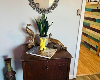 2 wooden bronze bird statues