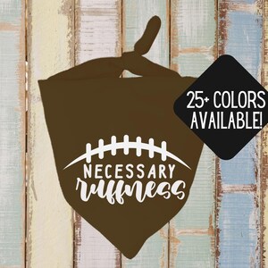 May include: A brown dog bandana with a white football graphic and the words "NECESSARY RUFFNESS". A black diamond-shaped graphic states "25+ COLORS AVAILABLE!"