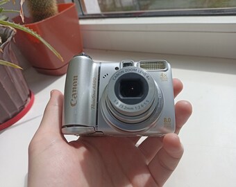 Canon PowerShot A570 IS Silver 7.1 MP digital compact camera WORKing Cheap Read!!