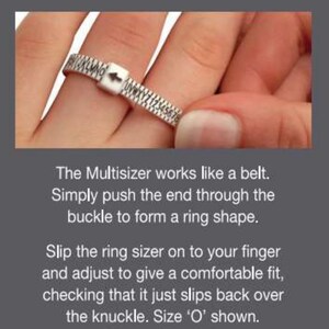 May include: A silver ring sizer with a buckle closure. The sizer is marked with letters and numbers. The text on the image reads "WORLD FAMOUS MULTISIZER" and "NOW SUPER SIZING FROM A - Z + 0" and "www.multisizers.com".