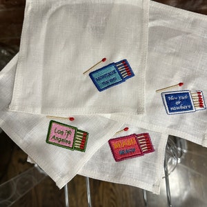 マッチブックアート刺繍布カクテルナプキンコースター4個セット - ニューヨーク、ロサンゼルス、マイアミ、モントーク
