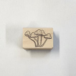 Tampon en caoutchouc pour petit groupe de champignons