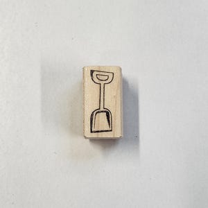 Rubberstempel zandschop