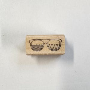 Rubberstempel zonnebril
