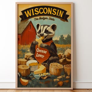 May include: Framed vintage-style poster featuring a badger wearing a "Cheese Lover" bib, eating cheese. The poster has the text "Wisconsin The Badger State" and depicts a red barn and various cheeses.