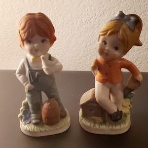 Vintage Boy and Girl Ceramic Figurines