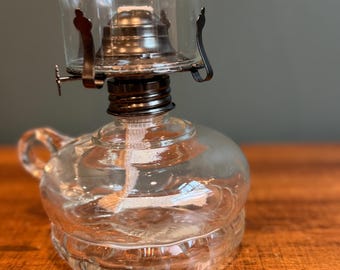 Orkaanolielamp glazen kamer