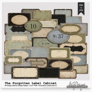 May include: A collection of thirty rectangular and oval vintage-style labels and plaques in muted shades of black, sage green, and dusty blue. The designs feature distressed textures, ornate corner flourishes, and some include numbers like 10, 37, and 1726.