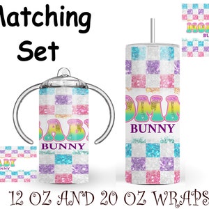 May include: A set of three tumbler wraps featuring a checkered pattern with glitter accents. The wraps feature the text "Mommy Bunny", "Baby Bunny", and "Daddy Bunny" in rainbow letters. The wraps are designed for 12 oz and 20 oz tumblers.
