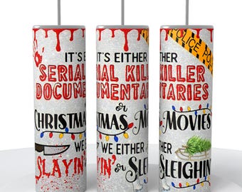 May include: Three white tumblers with red, black, and yellow text and graphics. The tumblers feature Christmas lights, a knife, and police tape. The text on the tumblers reads "It's either serial killer documentaries or Christmas movies", "It's either serial killer documentaries or Christmas movies", and "It's either serial killer documentaries or Christmas movies".