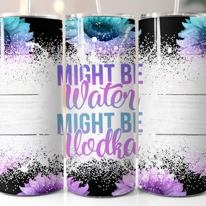 May include: A stainless steel tumbler with a black background and a white woodgrain design. The tumbler features a floral design with purple and blue flowers and the text "Might be water, might be vodka".