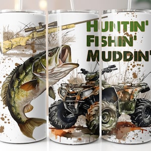 May include: White tumbler with a green, brown, and black camouflage design. The tumbler features a bass fish, a rifle, and an ATV. The text "Huntin' Fishin' Muddin'" is printed on the tumbler.