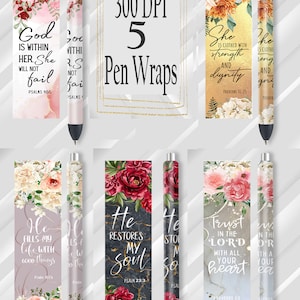 May include: Five printable pen wrap designs featuring floral patterns and inspirational quotes. The quotes include "God is within her. She will not fail", "He fills my life with good things", "He restores my soul", "She is clothed with strength and dignity", and "Trust in the Lord with all your heart".