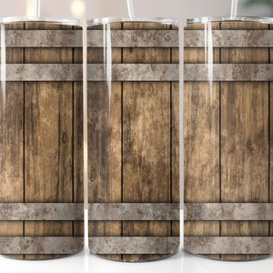 May include: Three stainless steel tumblers with a wood grain design and metal bands. The tumblers are brown and grey.