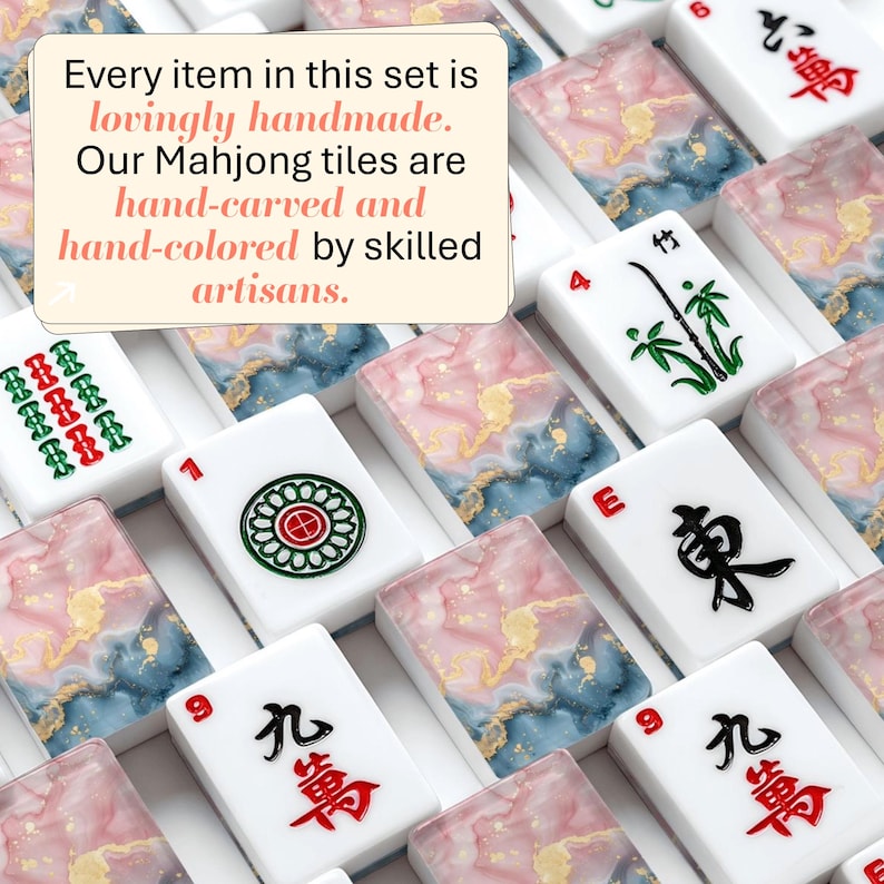 May include: A collection of rectangular Mahjong tiles featuring white surfaces with black, red, and green character engravings, interspersed with tiles displaying a pink, blue, and gold marbled pattern. Text reads: Every item in this set is lovingly handmade. Our Mahjong tiles are hand-carved and hand-colored by skilled artisans.